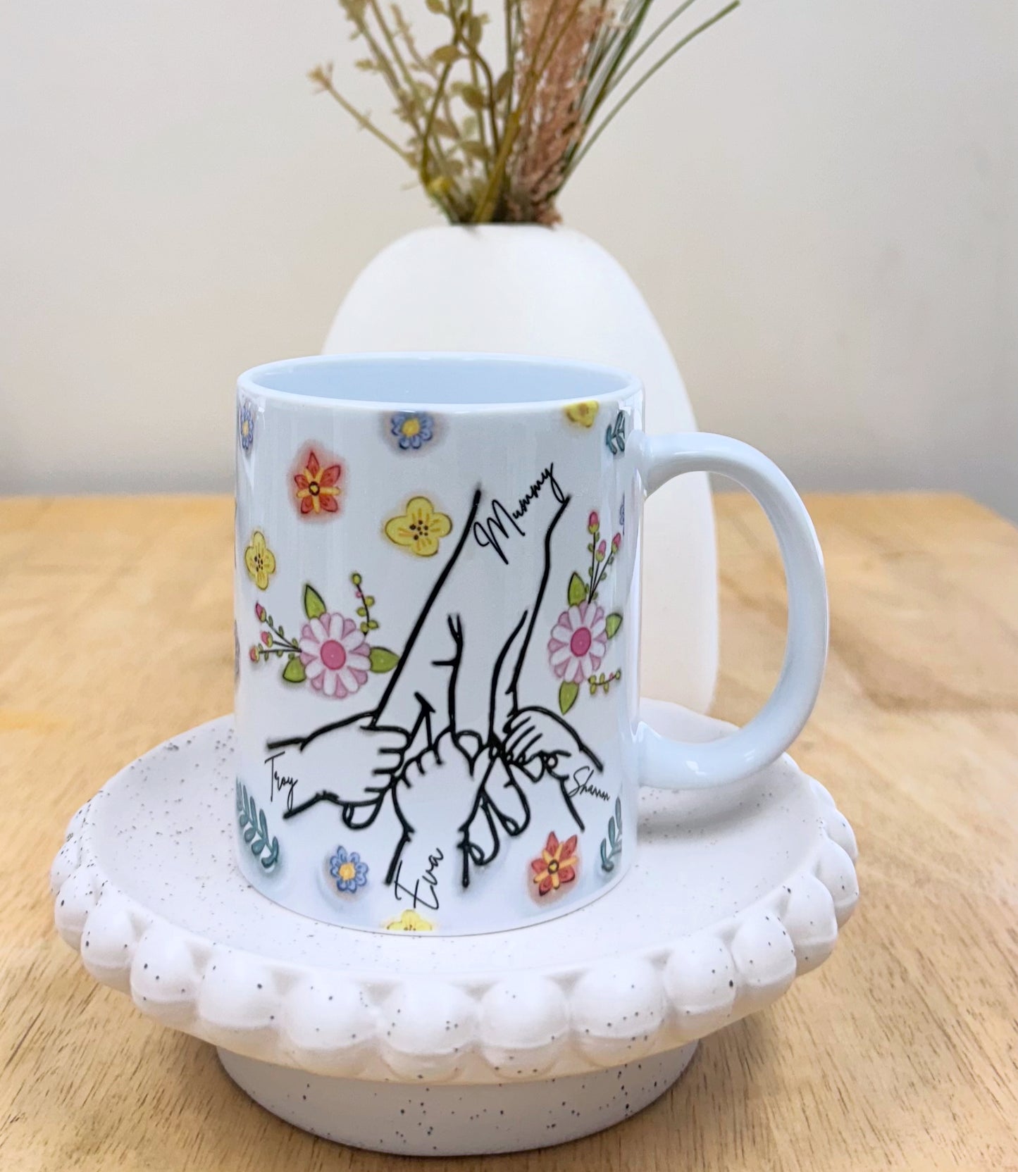 Personalised hand holding mug