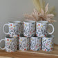 Personalised hand holding mug
