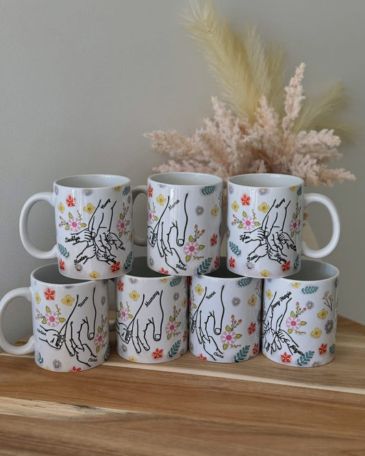 Personalised hand holding mug