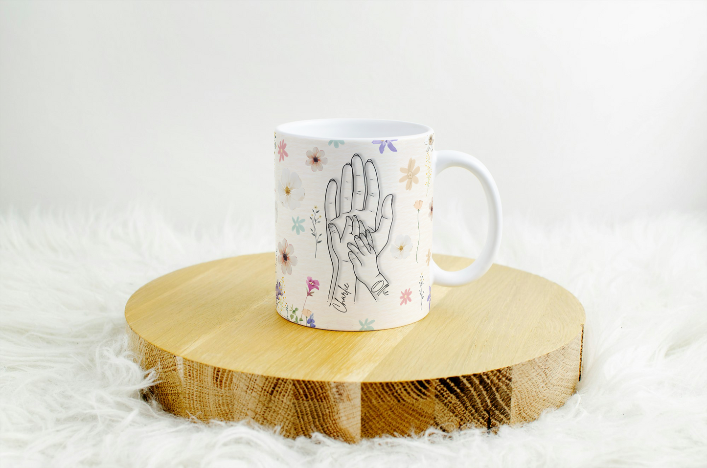 Personalised hand holding mug