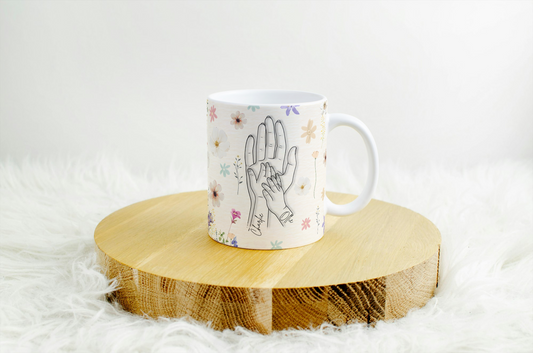 Personalised hand holding mug